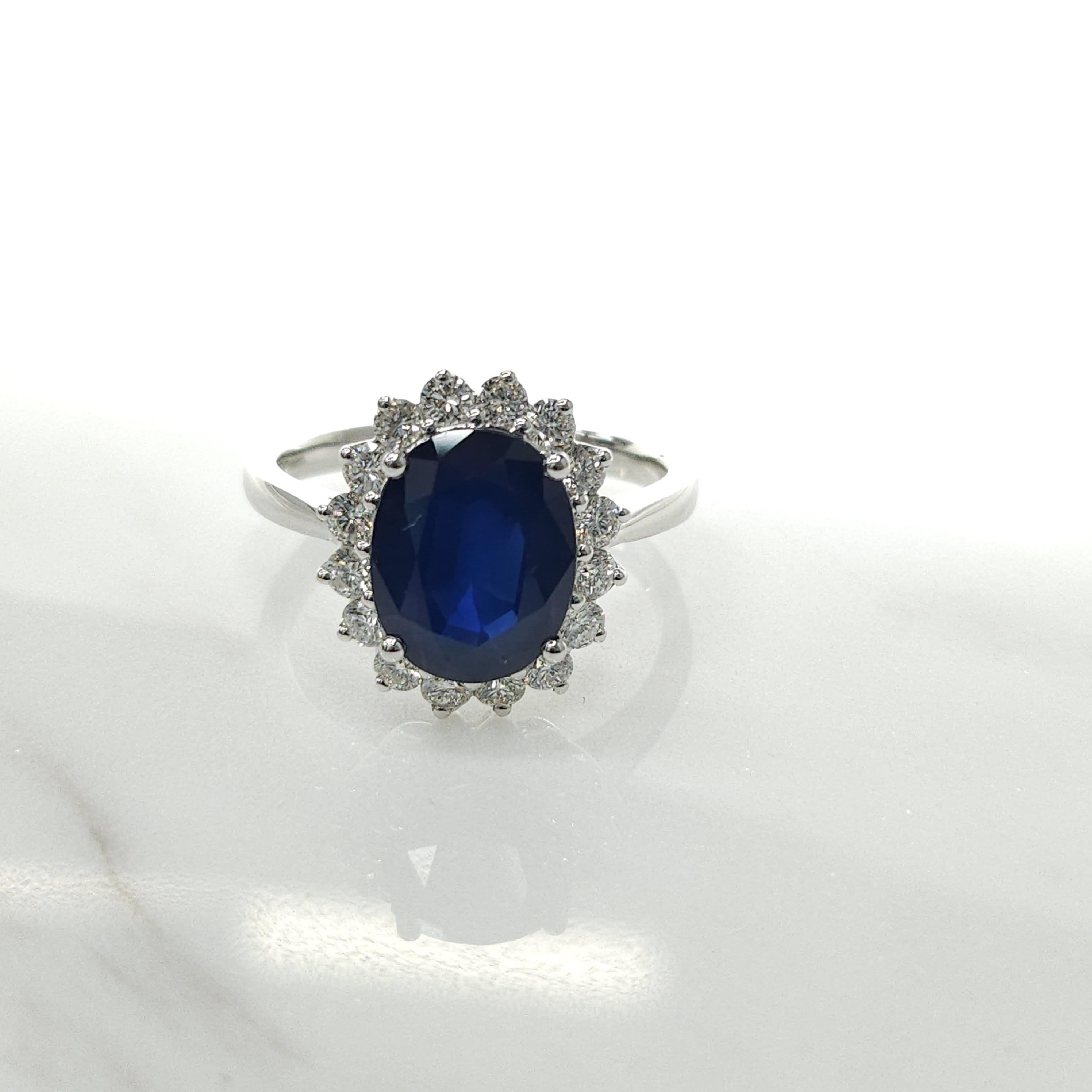 Oval Cut IGI Certified 2.90 Carat Blue Sapphire & Diamond Ring in 18K White Gold For Sale
