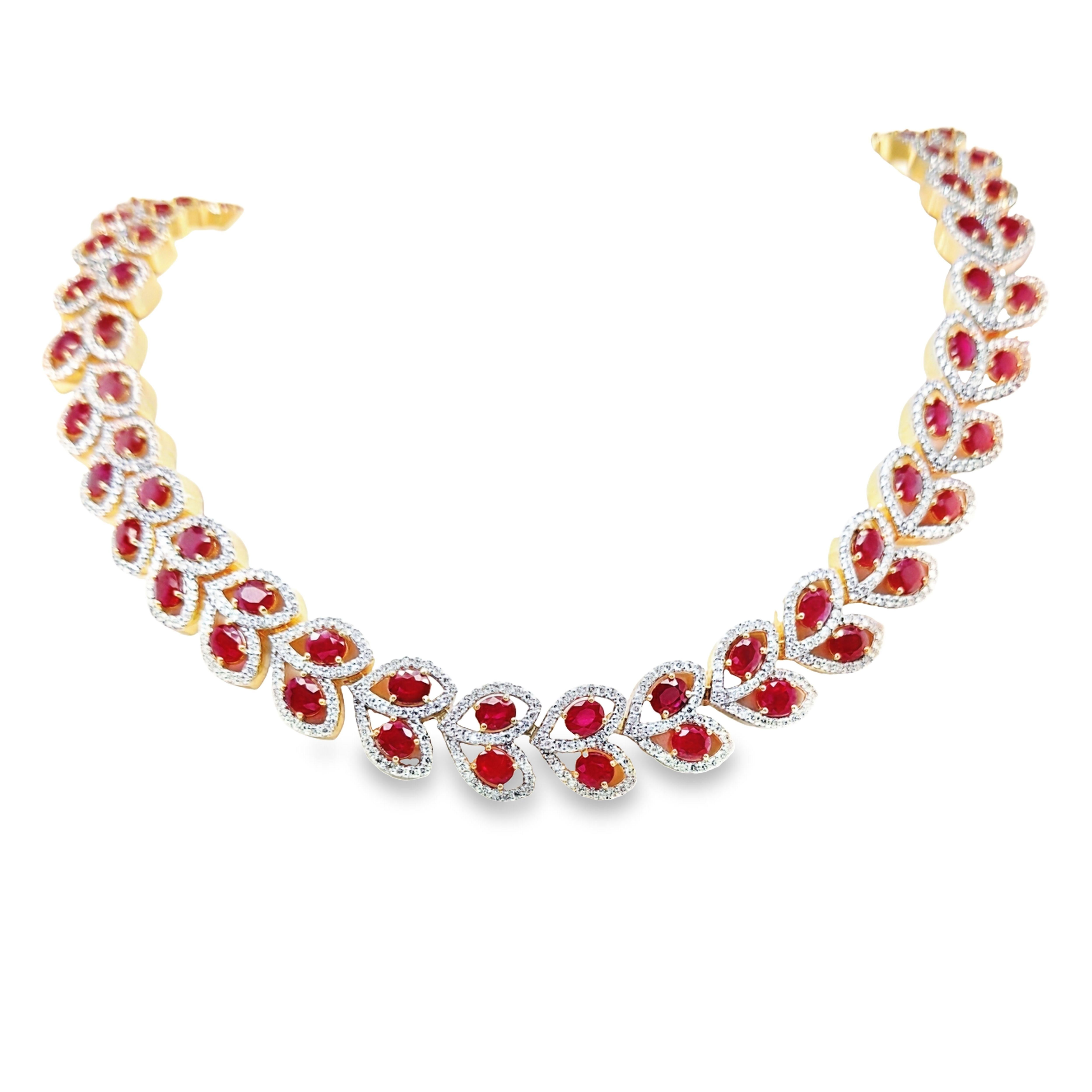 Immerse yourself in the allure of this exquisite necklace featuring an array of opulent gemstones. Crafted from the finest materials, this necklace boasts 76 oval mixed-cut rubies from Burma, certified by IGI for their natural origin, totalling an