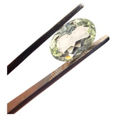 IGI Certified 2.92ct Very Light Yellowish Green Oval-Shaped Tourmaline Gemstone