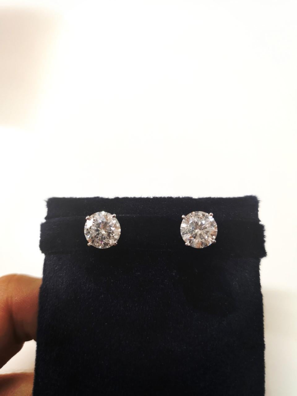 This gorgeous 3 carat pair of round brilliant cut natural diamonds offer fantastic size, bright white color, and a lively play of light! Measuring 8.1mm in diameter, the diamonds have a great spread and a larger than typical look for their weight!