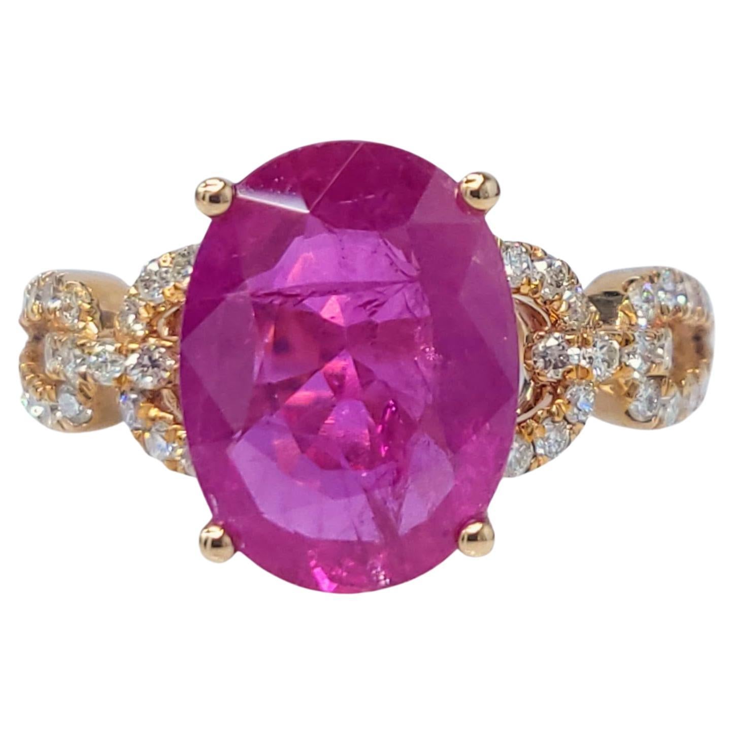 This exquisite ring showcases a stunning 3.00-carat oval-shaped Burmese ruby, renowned for its intense pink-red color and exceptional clarity. The ruby is set in a classic four-prong setting, allowing its brilliance to shine.

The band of the ring
