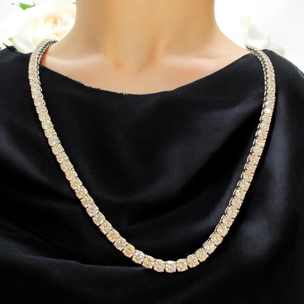 Simply diamonds, simply exquisite and luxurious. And perfectly finished with Delicate and flawless craftsmanship.
The tennis diamonds necklace exuded luxury and sophistication. It was a piece of jewelry that demanded attention and admiration