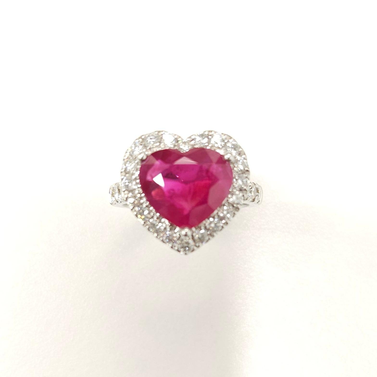 Burmese rubies are sought after for their beautiful red tones. This 18k white gold ring featuring a 3.08 carat rare heart-shaped ruby is a great example of the Burmese allure - deep red tones with the slightest hint of pink. Halo set with round