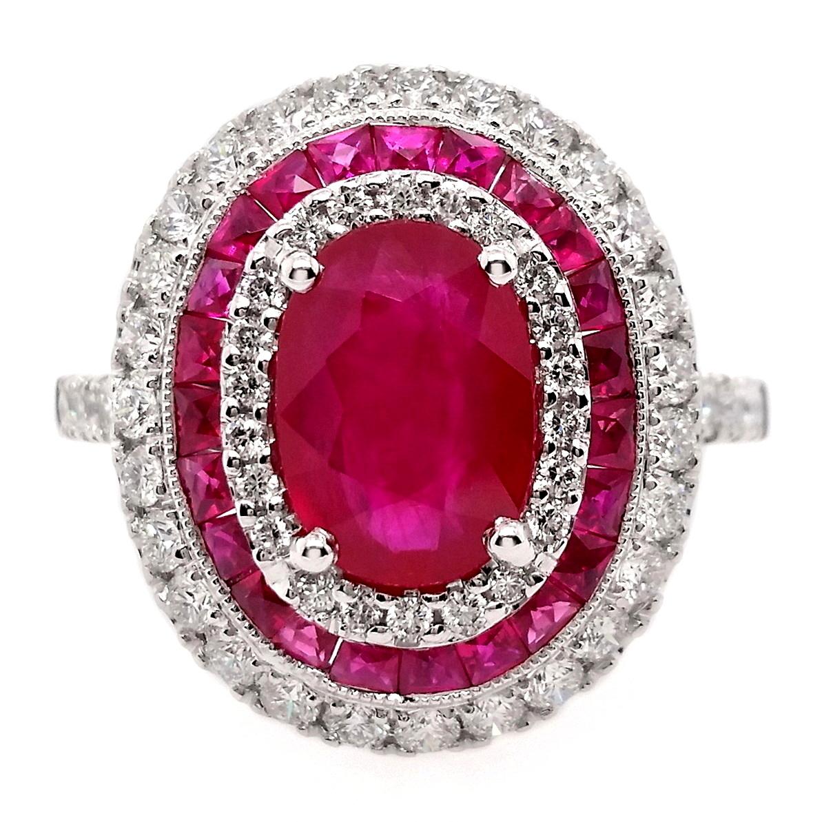 Indulge in the epitome of luxury with our 18k white gold ring—featuring a captivating oval-cut 2.59 carats ruby and a scintillating ensemble of 23 natural trapeze-cut rubies and 57 round brilliant sparkling diamonds. Embrace the allure of this