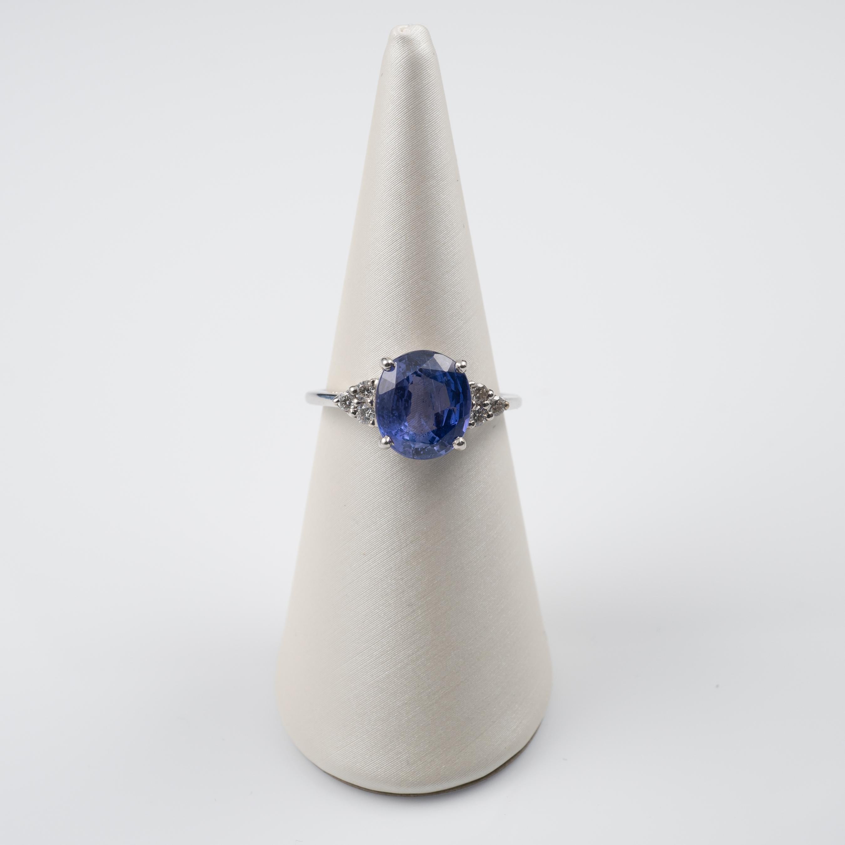 This fabulous and unique natural 3.55-carat blue to violet colour change sapphire and diamond cocktail ring is crafted in 18 karat white gold.

Featuring a colour changing blue to violet sapphire gemstone of 3.55 carats with a triangular cluster of