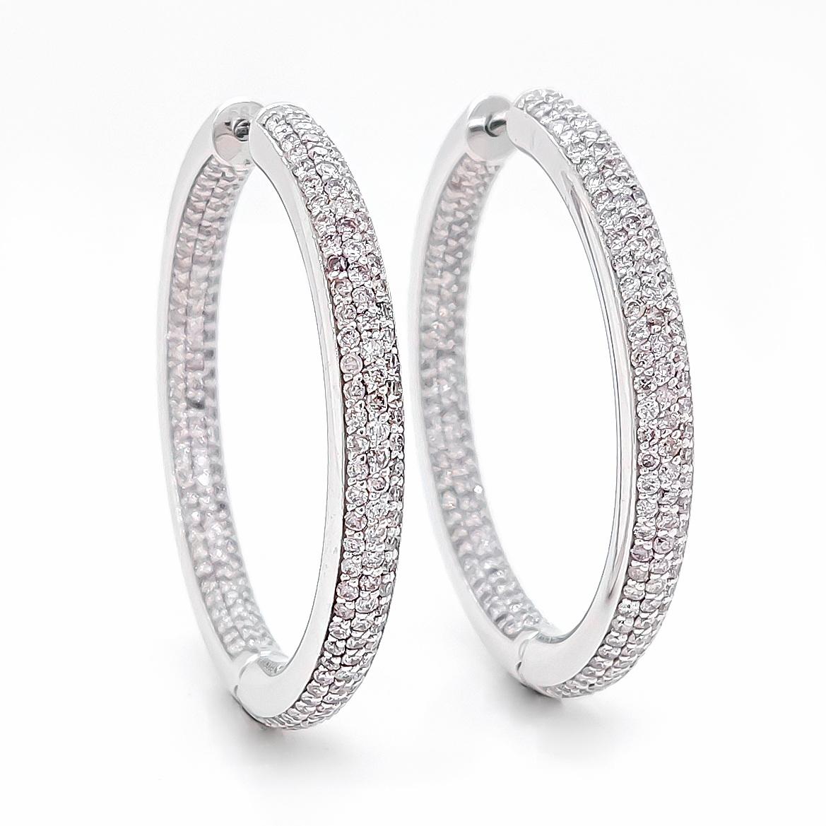 FOR US CUSTOMERS NO VAT

Pink diamonds are extremely unique and rare, ranking as the most special colored diamonds worldwide.

These stunning earrings feature a total of 402 round brilliant cut diamonds, with a combined weight of 3.62 carats,