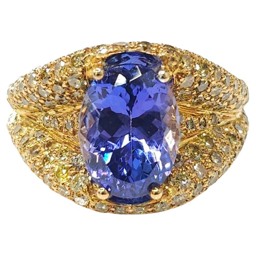 Step into a world of unparalleled elegance with this exquisite modern style ring showcasing a magnificent IGI Certified 3.76 Carat tanzanite in a vivid bluish-violet hue, expertly cut into an alluring oval shape that radiates sophistication and