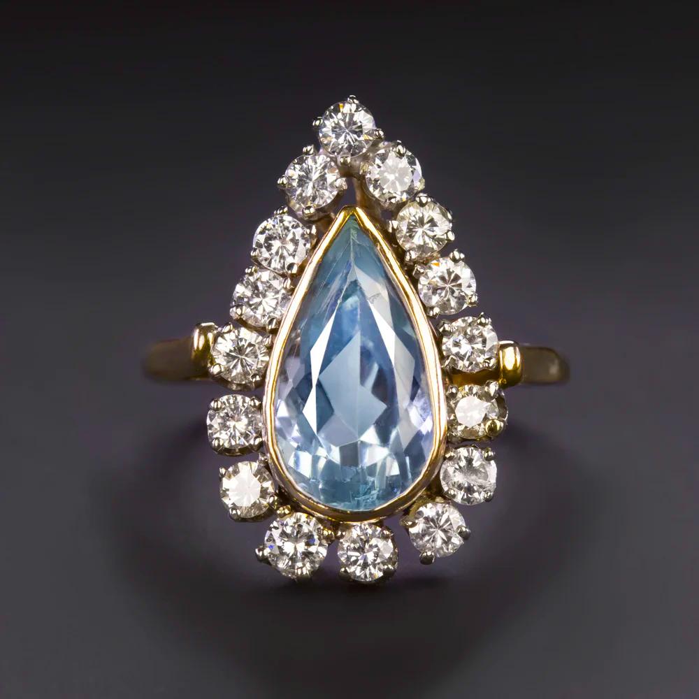 Art Deco IGI Certified 3.80ct Pear Shaped Aquamarine Cocktail Ring with Diamond Halo For Sale