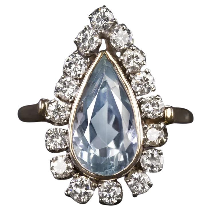 IGI Certified 3.80ct Pear Shaped Aquamarine Cocktail Ring with Diamond Halo