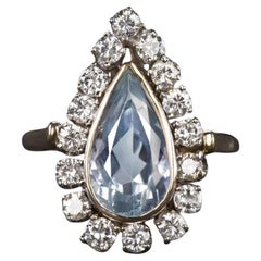 IGI Certified 3.80ct Pear Shaped Aquamarine Cocktail Ring with Diamond Halo