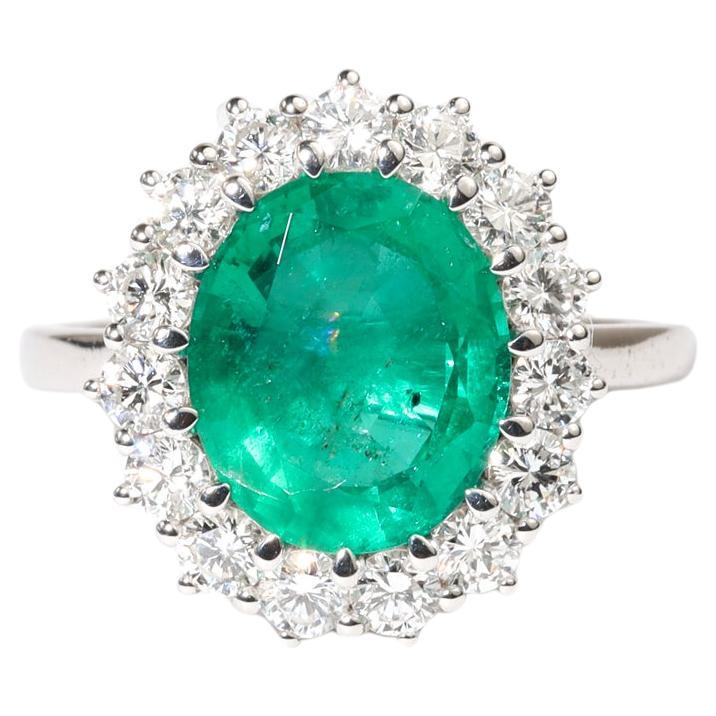 IGI Certified 3ct Oval Emerald & Diamond Halo Engagement Ring - 18K White Gold
