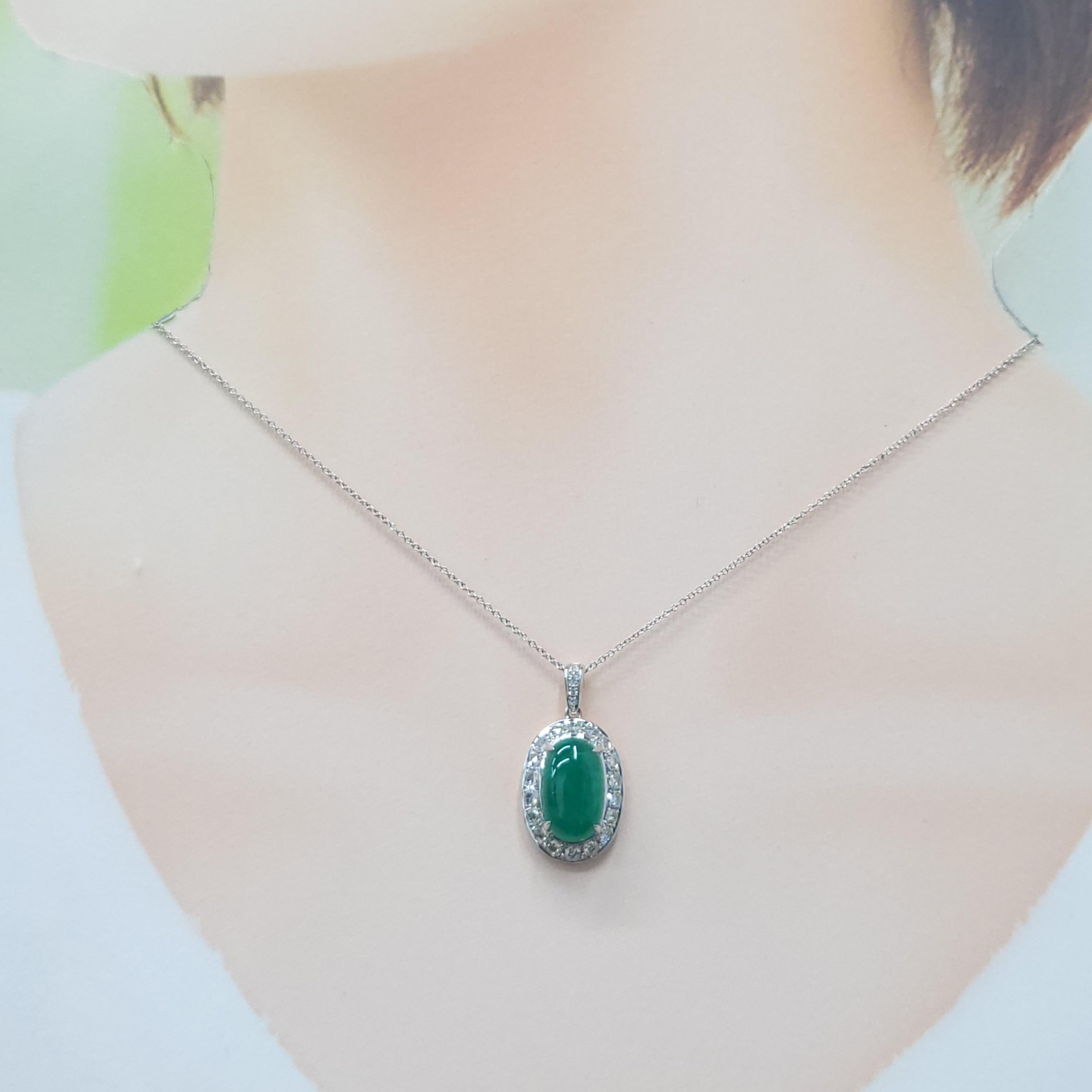 Discover the captivating beauty of this sophisticated pendant, showcasing a magnificent 4.00 carat natural emerald. The elegant oval cut perfectly displays the gem's rich and intense bluish green hue, a color that embodies natural elegance and