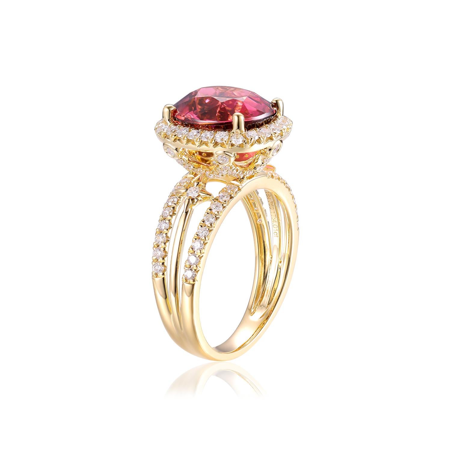 This exquisite ring is a stunning piece of jewelry crafted in luxurious 18-karat yellow gold. At its center is a captivating 4.01-carat cushion-cut tourmaline, displaying a rich and vibrant hue that draws the eye. The tourmaline is elegantly framed