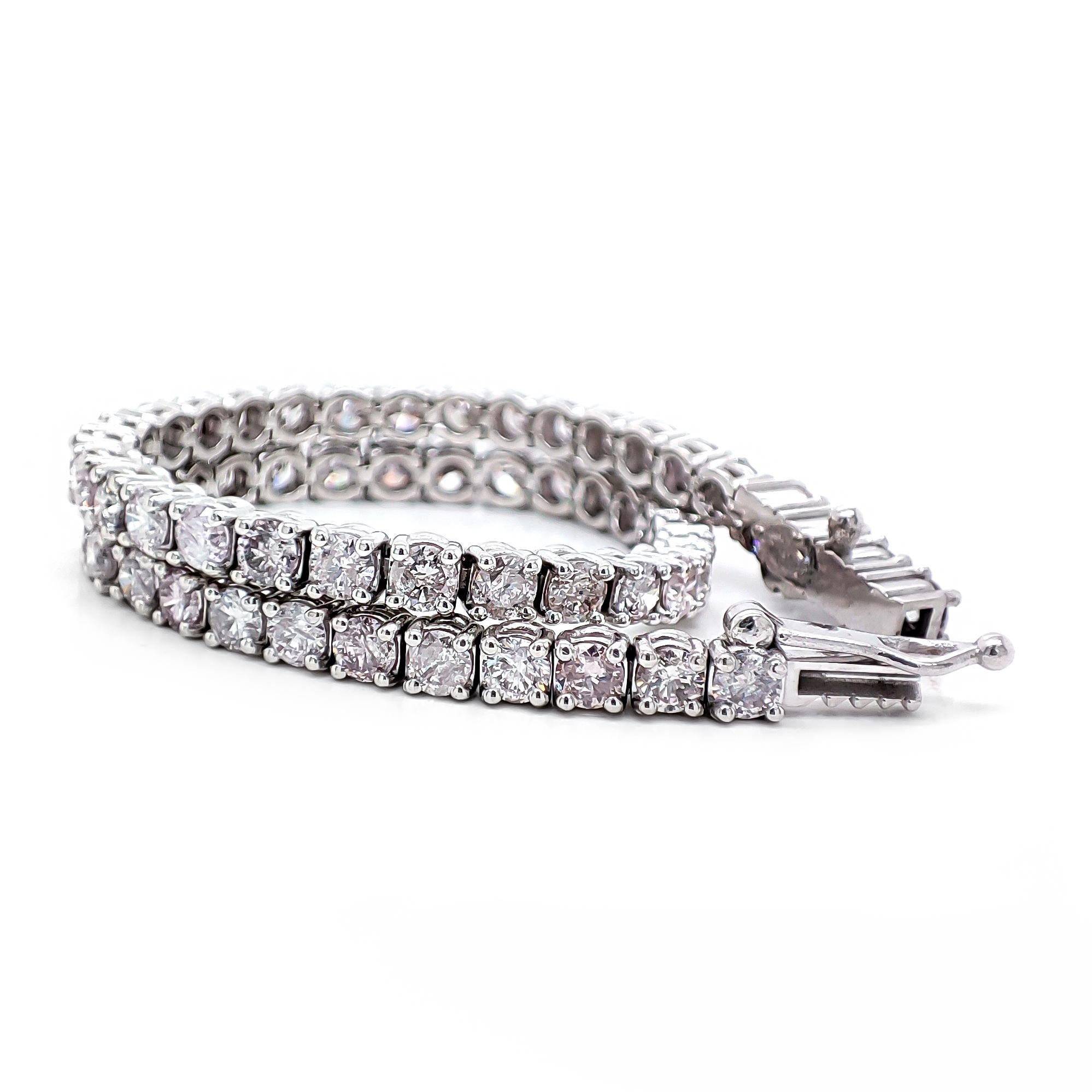 FOR CUSTOMERS FROM THE USA NO VAT

Pink diamonds are extremely unique and rare, ranking as the most special colored diamonds worldwide.

This bracelet showcases 58 natural round brilliant-cut diamonds totaling 4.12 carats, exhibiting a captivating