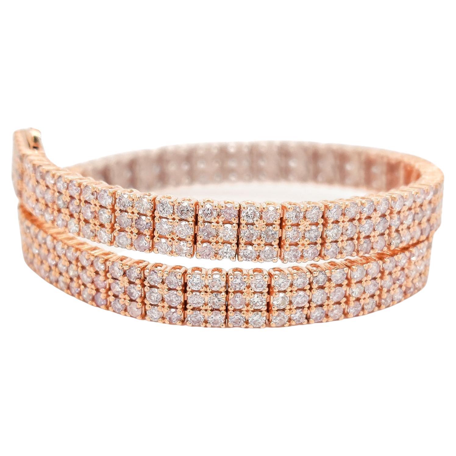 FOR US CUSTOMERS NO VAT.

In this gorgeous 14kt pink gold bracelet 300 mesmerizingly sparkling pink diamonds, totaling 4.40 carats, are all beautifully set in three raws and make a very feminine, elegant, and unique design. Pink diamonds and pink