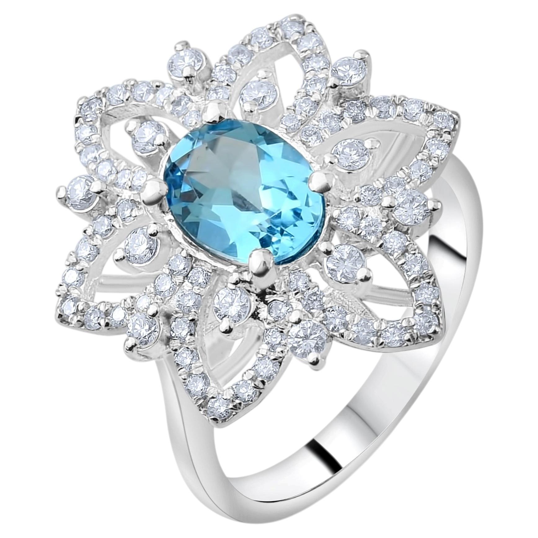 Bague imposante en or 18 carats sertie d'un diamant certifié IGI de 4,50 carats et d'une topaze bleue