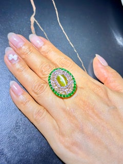 IGI Certified 4.60 Cts Natural Cat's Eye Chrysoberyl Diamond & Emerald Ring.