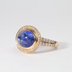 IGI Certified 4.8ct Oval Cabochon Tanzanite & Diamond Halo Ring - 18k YellowGold