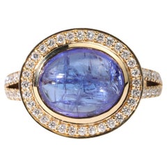IGI Certified 4.8ct Natural Oval-Cut Cabochon Tanzanite & Diamond Halo Ring