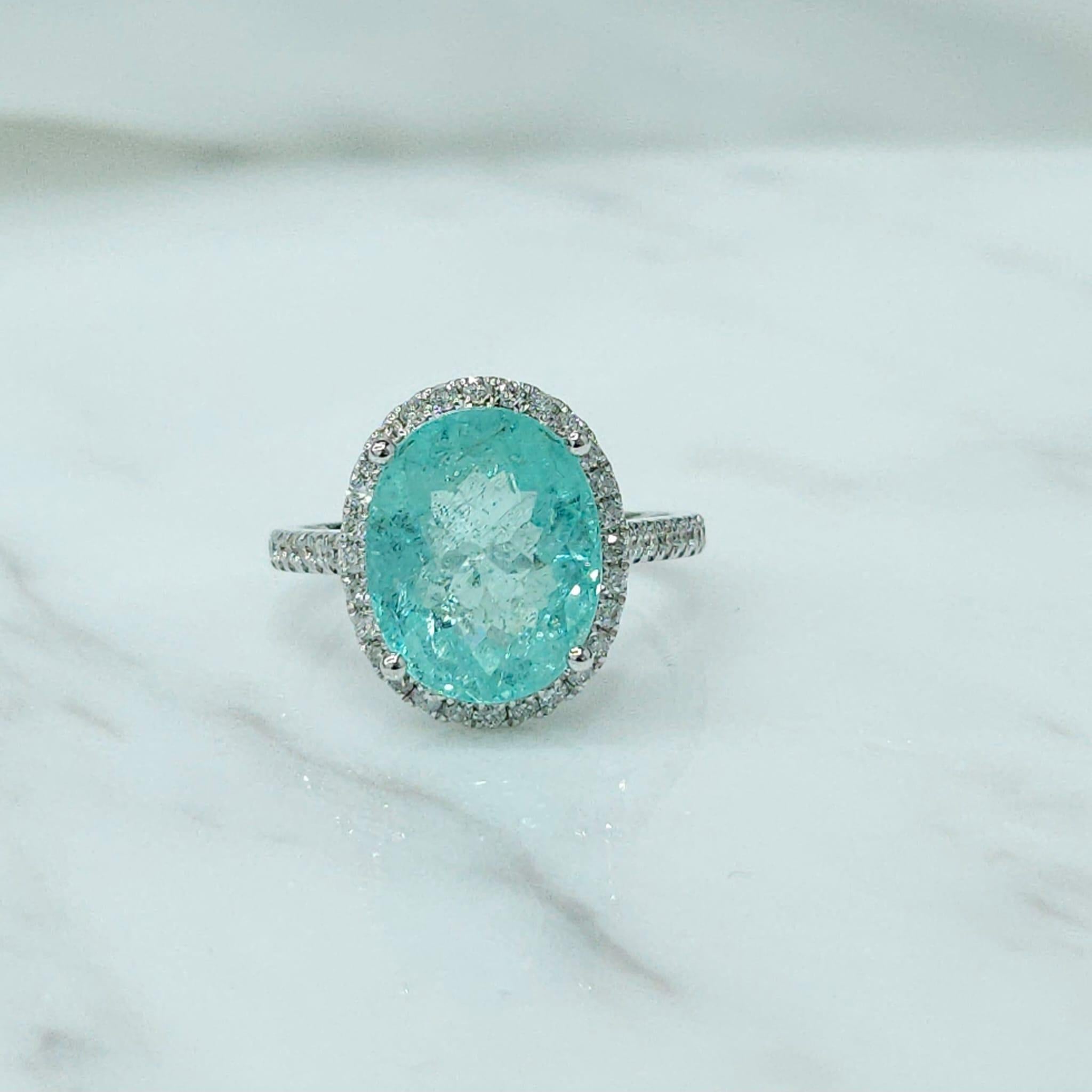 Oval Cut IGI Certified 5.36 Carat Paraiba & Diamond Ring in 18K White Gold For Sale