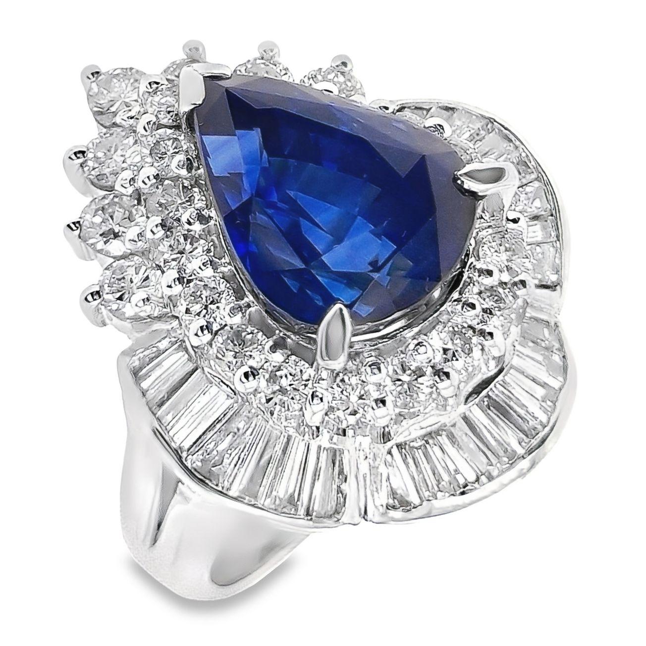 Step into a world of unparalleled luxury with this platinum ring, graced by a 5.79ct Natural Kashmir Sapphire Vivid Blue and accompanied by 1.73ct Natural Diamonds. This masterpiece features a pear mixed-cut sapphire of Kashmir origin, renowned for