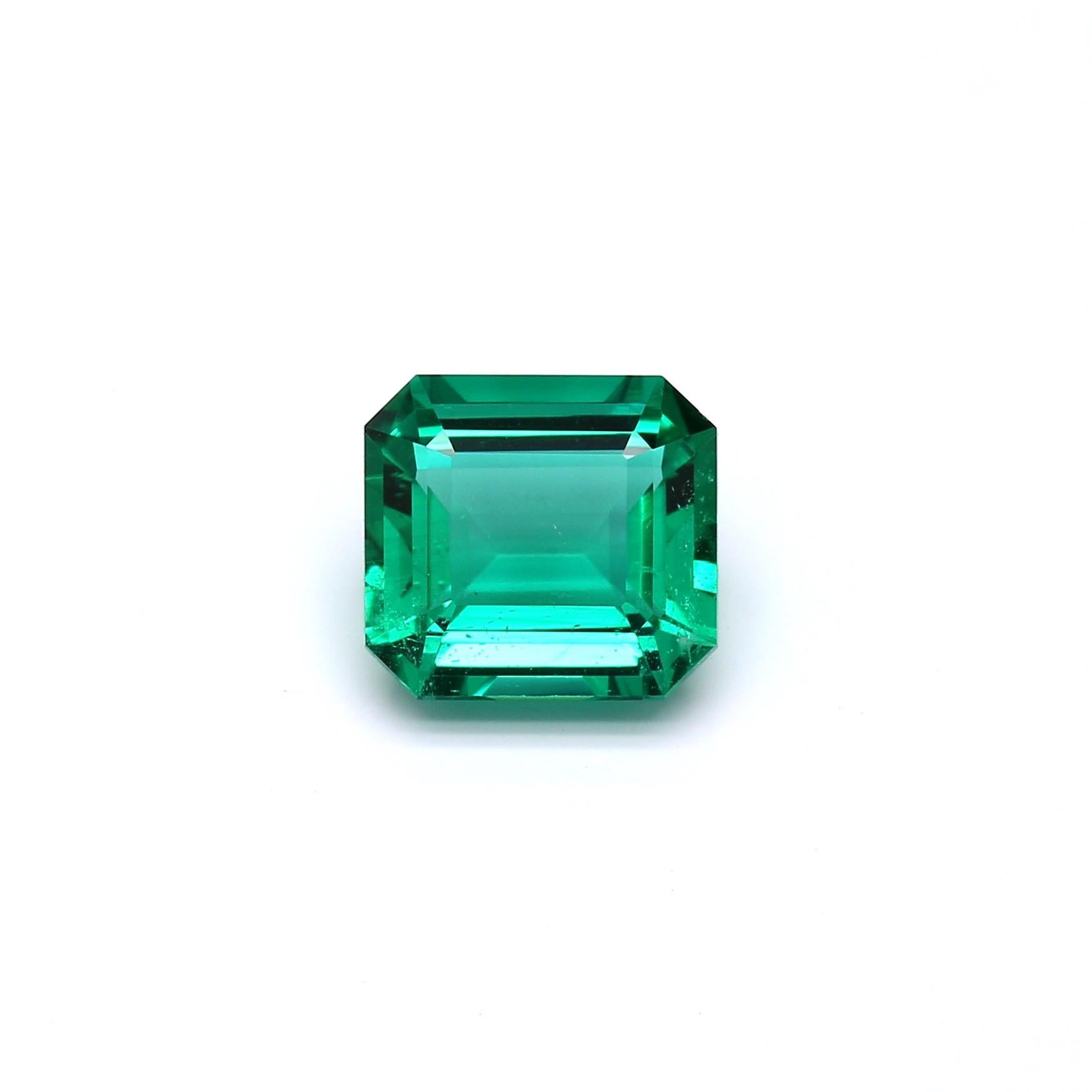 Emerald Cut IGI Certified 5.90 Carat Minor Oil Green Emerald Diamond Ring