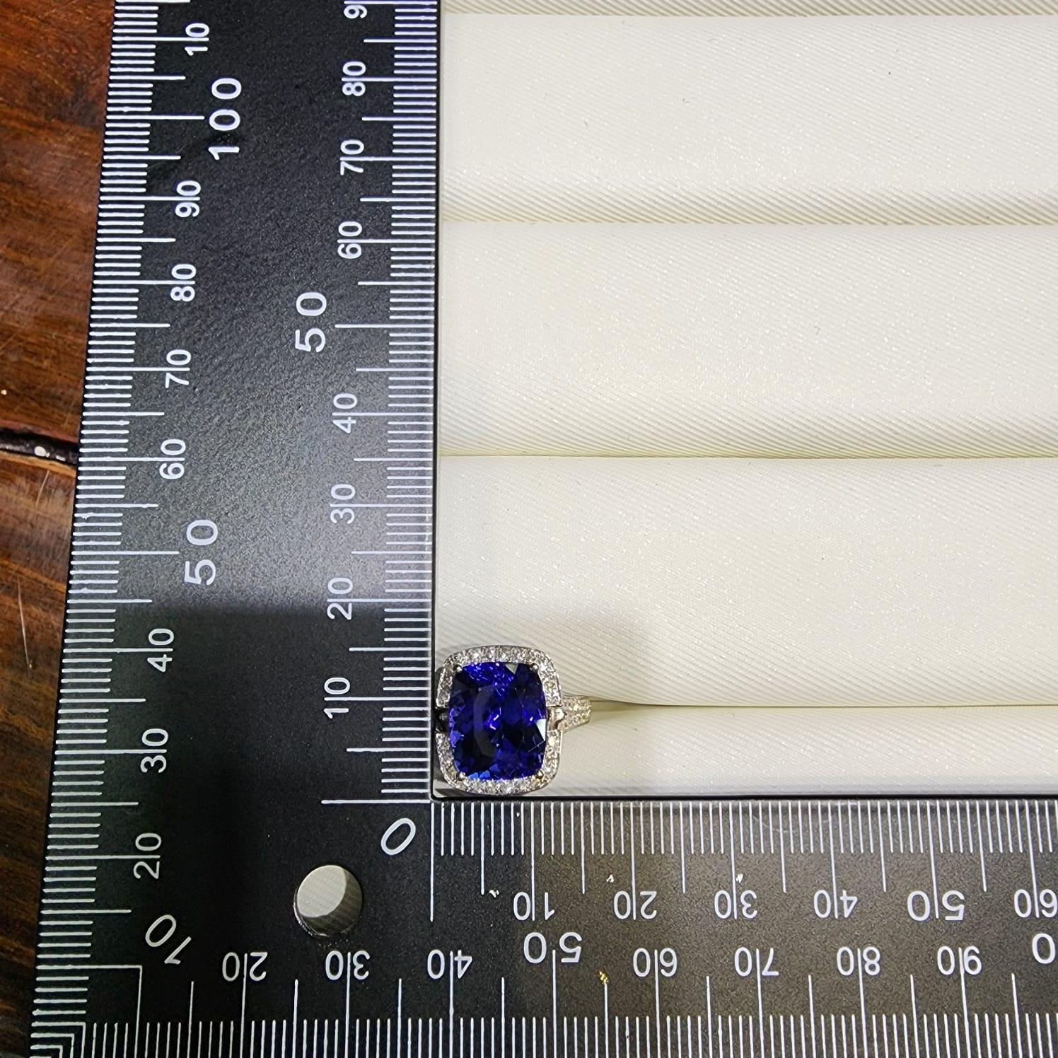 Contemporary IGI Certified 6.08 Carat Tanzanite Diamond Cocktail Ring in 18K White Gold For Sale
