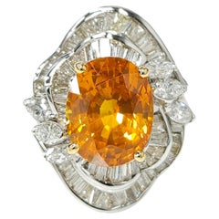 Bague en or blanc 18 carats avec saphir orange de Ceylan certifié IGI de 6,08 carats et diamants