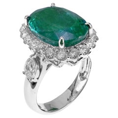 IGI Certified 7.15 Carat Emerald 1.58 Carat White Diamond Solitaire 18k Ring