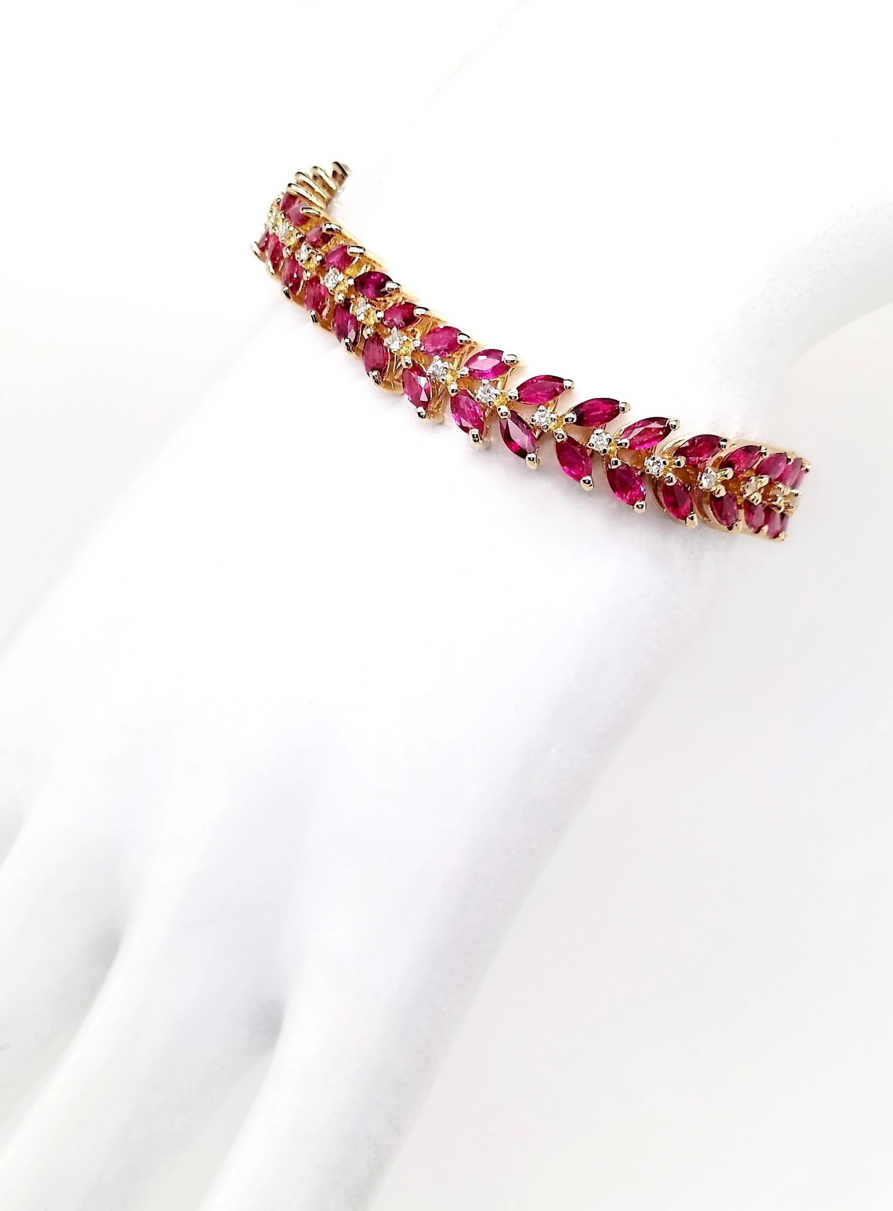 This majestic bracelet, from Top Crown Jewelry, is made of 18KT yellow gold, natural marquise-cut rubies and round brilliant-cut natural sparkling diamonds, especially for making your life stylish than ever. 
Bracelet long is 17cm.

This bracelet is