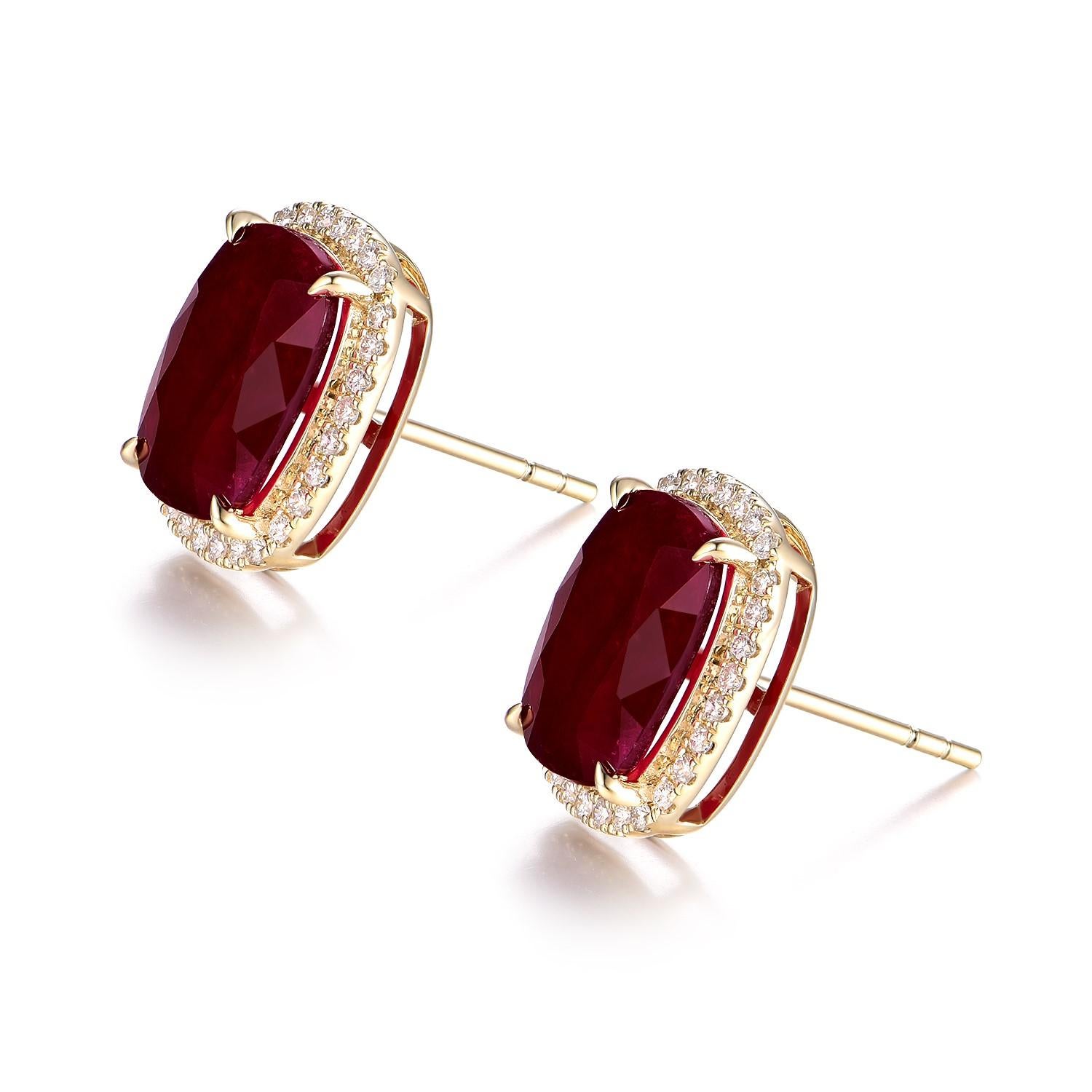 These radiant earrings are a testament to timeless design and luxury. Crafted in 14K yellow gold, each earring showcases a stunning ruby, with a combined weight of 8.29 carats, radiating with a deep red hue that is both bold and enchanting. The