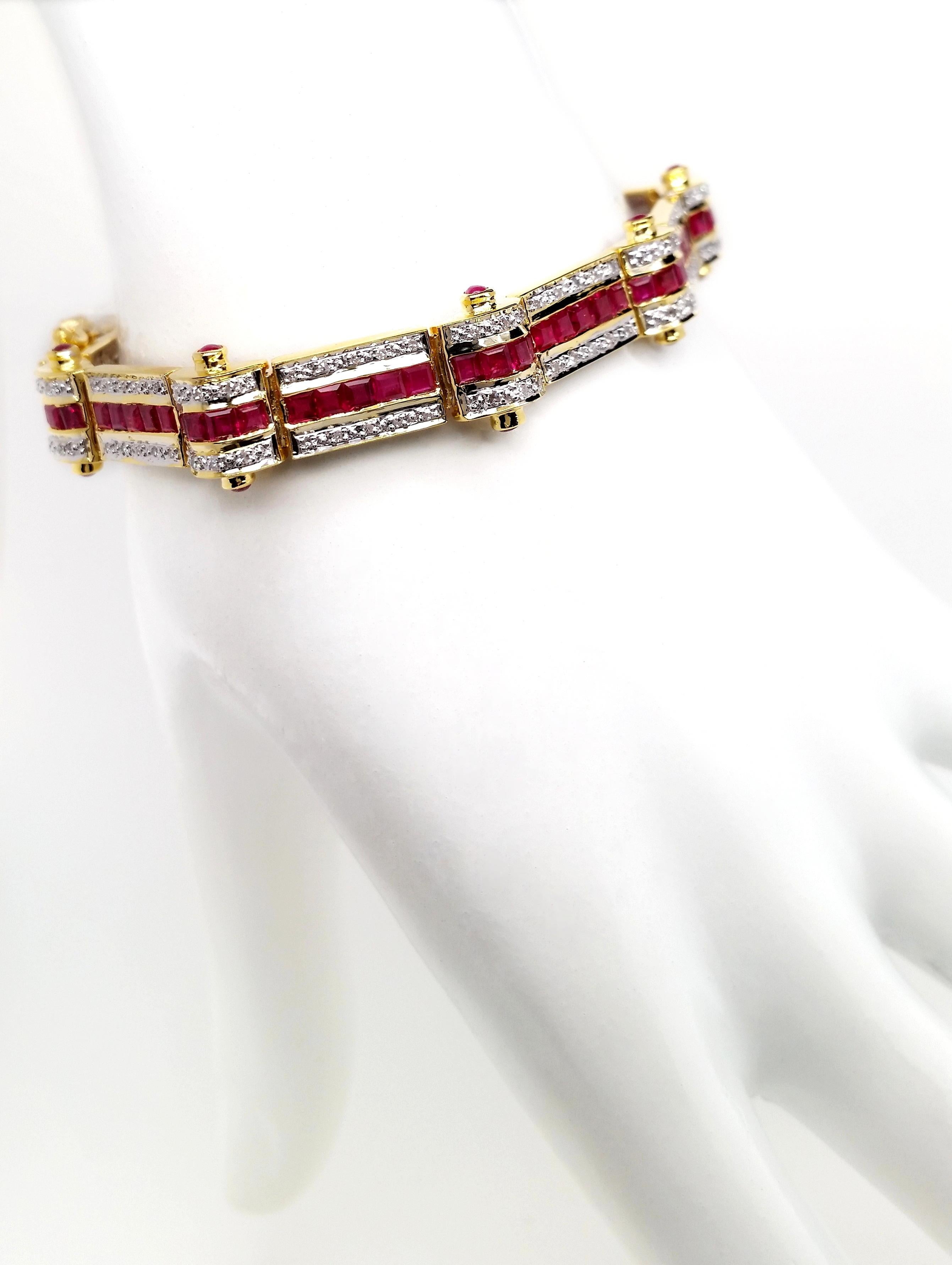 This chic bracelet, from the house of Top Crown Jewelry collection, is a unique piece of jewelry inspired by the delicate intricacy of a traditional.
The center stones are a charming natural intense purplish-red color rubies, accented by 100%