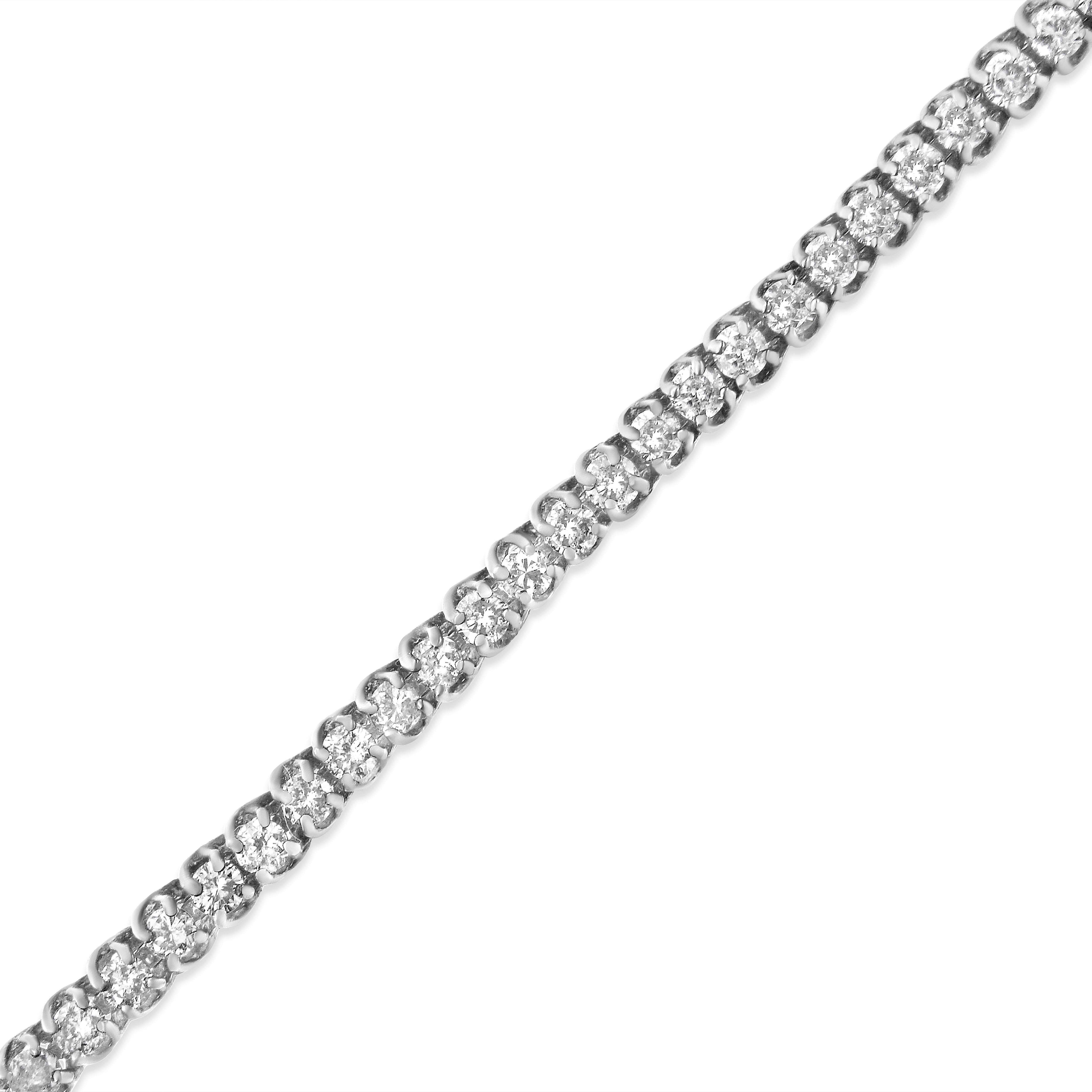 Elegant and timeless, you can't go wrong with this everlasting tennis bracelet. Round-cut diamonds sparkle in silver links in this 4 carat piece. The 7