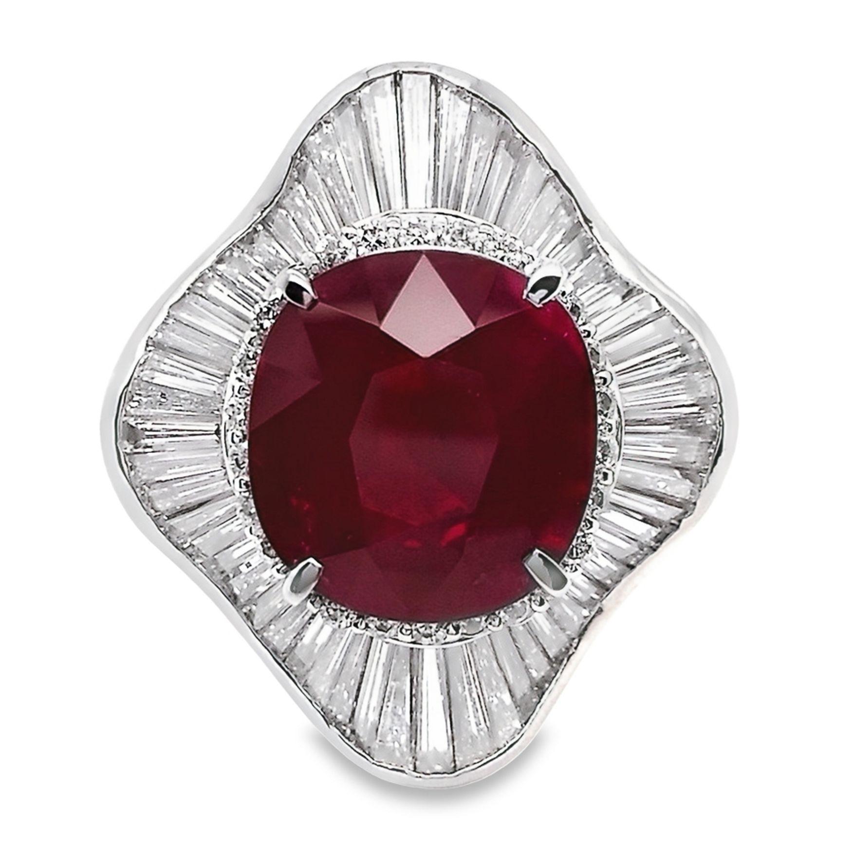 Behold this platinum masterpiece: a breath-taking ring featuring an extraordinary 9.39-carat natural Burma ruby embraced by 3.93 carats of brilliant natural diamonds. The mesmerizing ruby displays a captivating deep purplish-red hue with enchanting