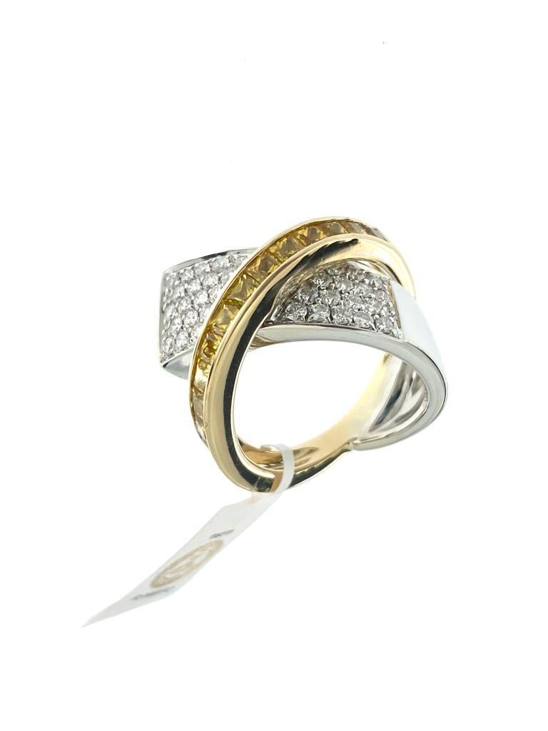Der IGI-zertifizierte Goldring aus Alfieri und St. John mit gelben Saphiren und Diamanten ist ein luxuriöses und sorgfältig gefertigtes Schmuckstück, das Eleganz und Raffinesse ausstrahlt. Der Ring besticht durch die Kombination von 18-karätigem