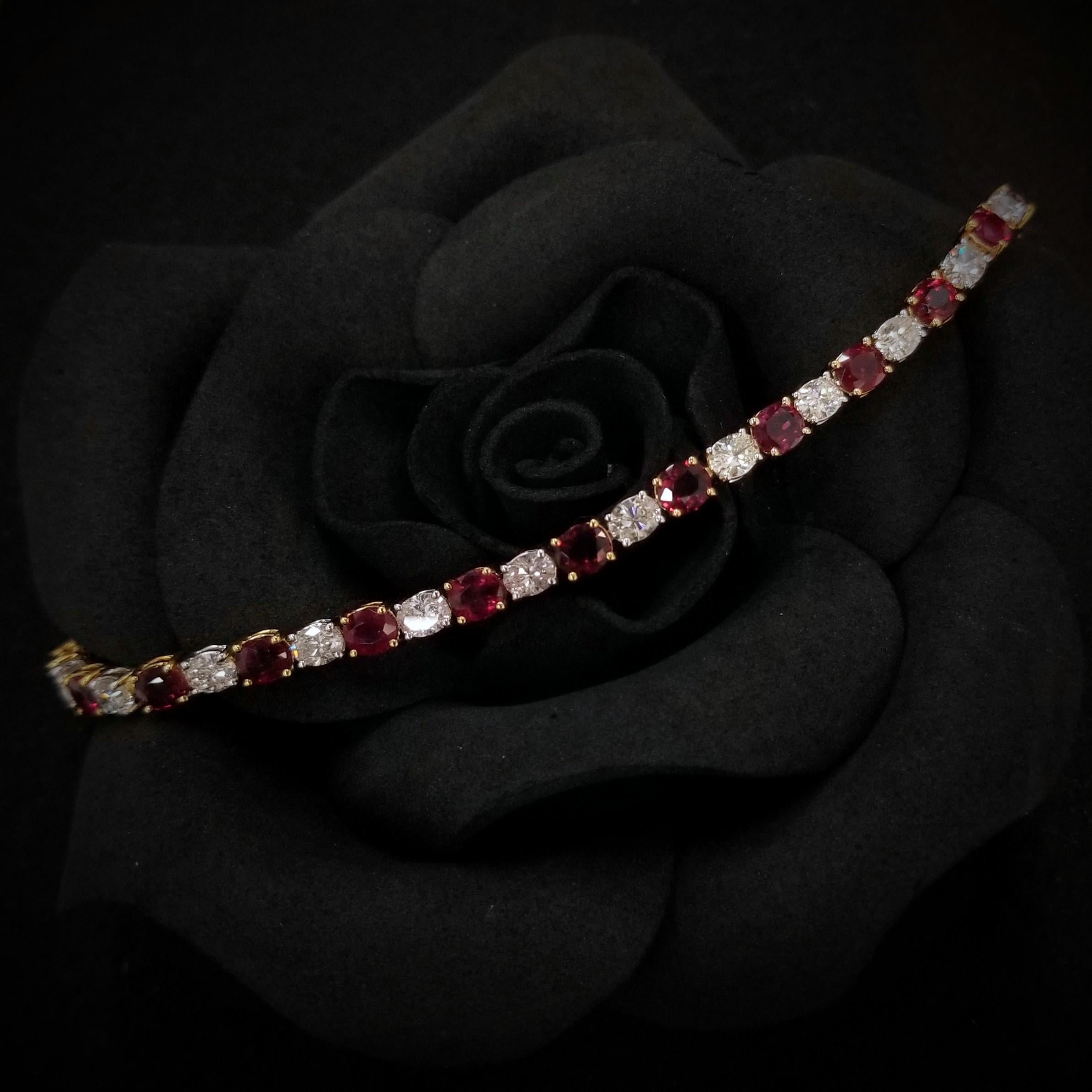 Presenting a stunning masterpiece, behold the IGI Certified Alternating 5.50 Ct Ruby & 3.85 Ct Diamond Bracelet in 18K Gold. This exquisite bracelet showcases the breathtaking combination of oval-shaped ruby and diamond gemstones, expertly set in a