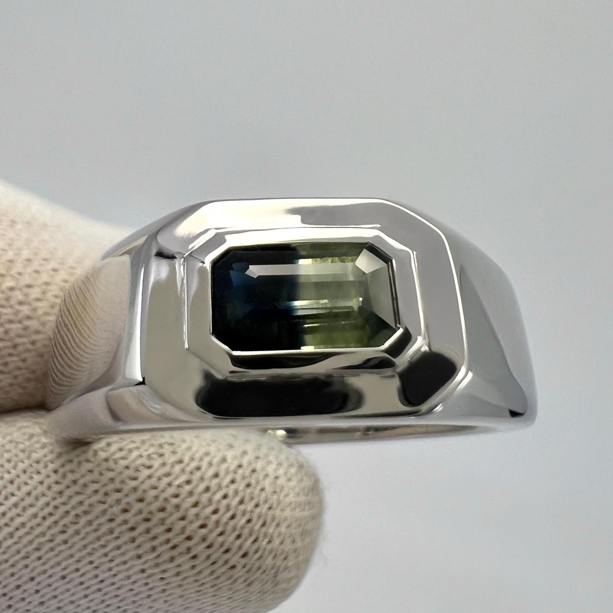 Unique Natural Bi Colour Blue & Yellow Sapphire In a fine 18k White Gold East West Rubover Bezel Solitaire Ring.

IGI Certified 0.60 carat sapphire with a unique deep blue and light yellow bi colour effect. Unique colour gem with perfect colour
