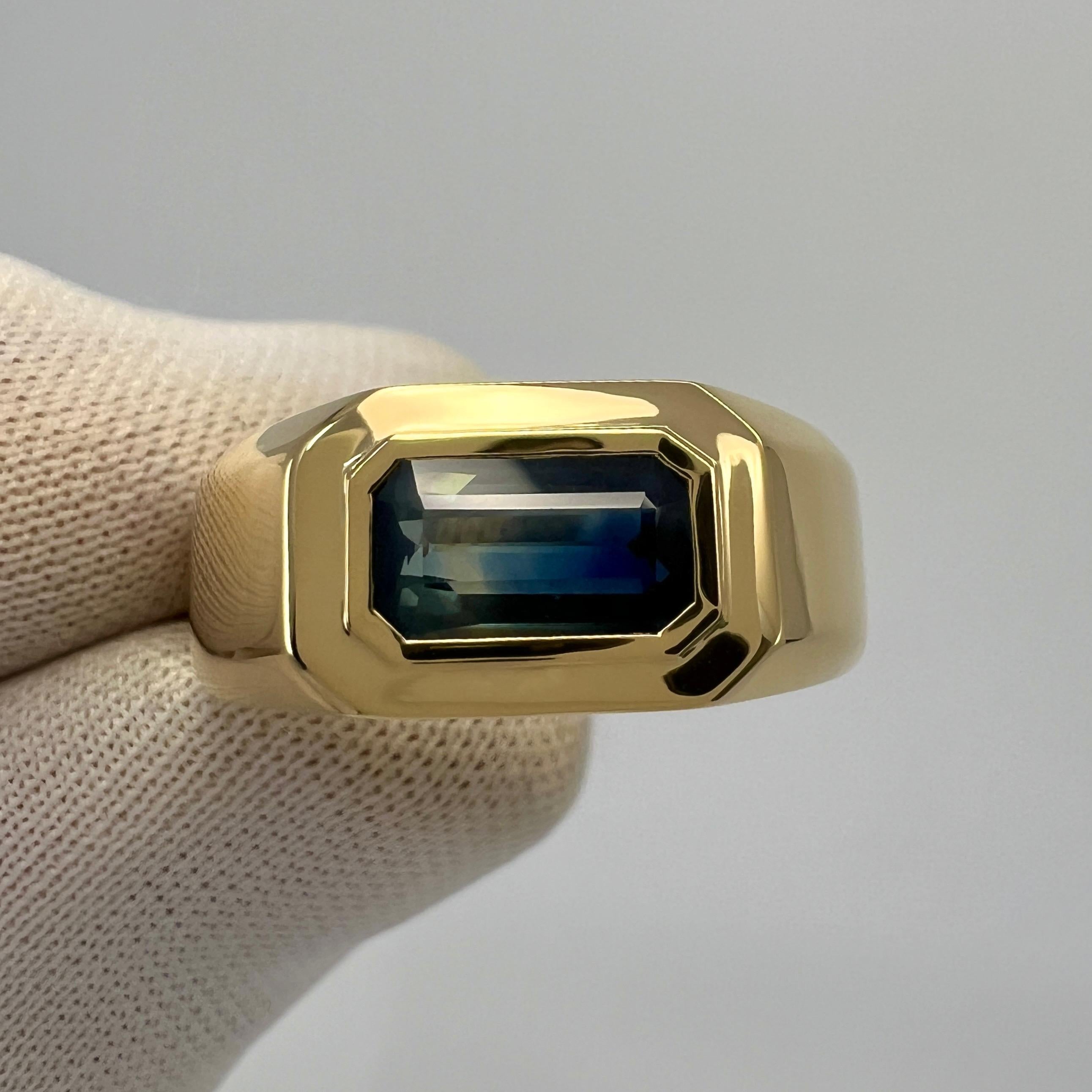 Unique Natural Parti Colour Blue & Green Untreated Sapphire In a fine 18k Yellow Gold East West Rubover Bezel Solitaire Ring.

IGI Certified 0.99 carat sapphire with a unique deep blue and light yellow green parti colour effect. Unique and vivid