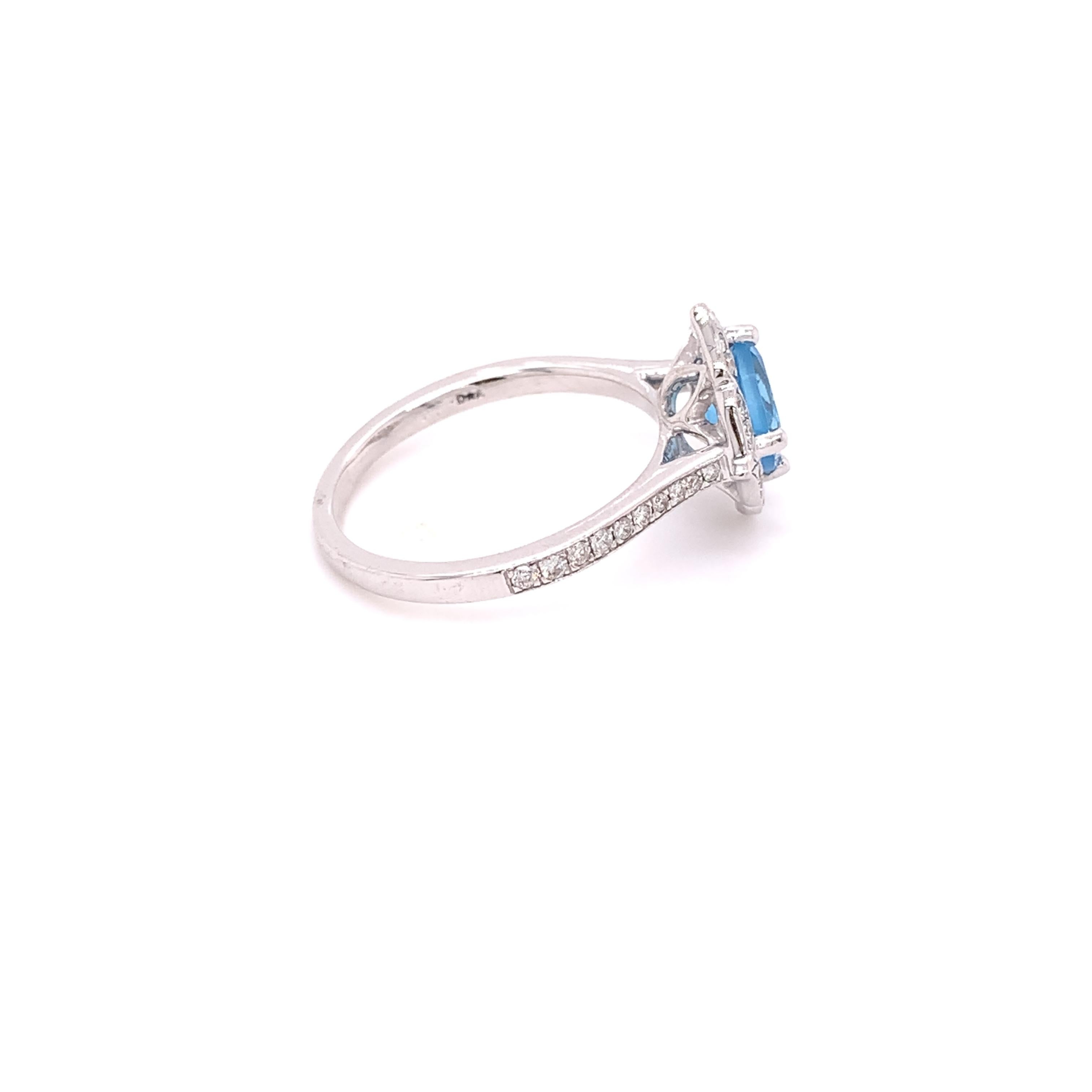 14 Karat Weißgold Ring mit IGI-zertifiziertem Blautopas und Diamant (Kissenschliff) im Angebot