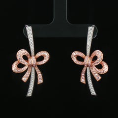 IGI Certified Bow Shape Earrings with Natural Pink Diamonds and White Diamonds
