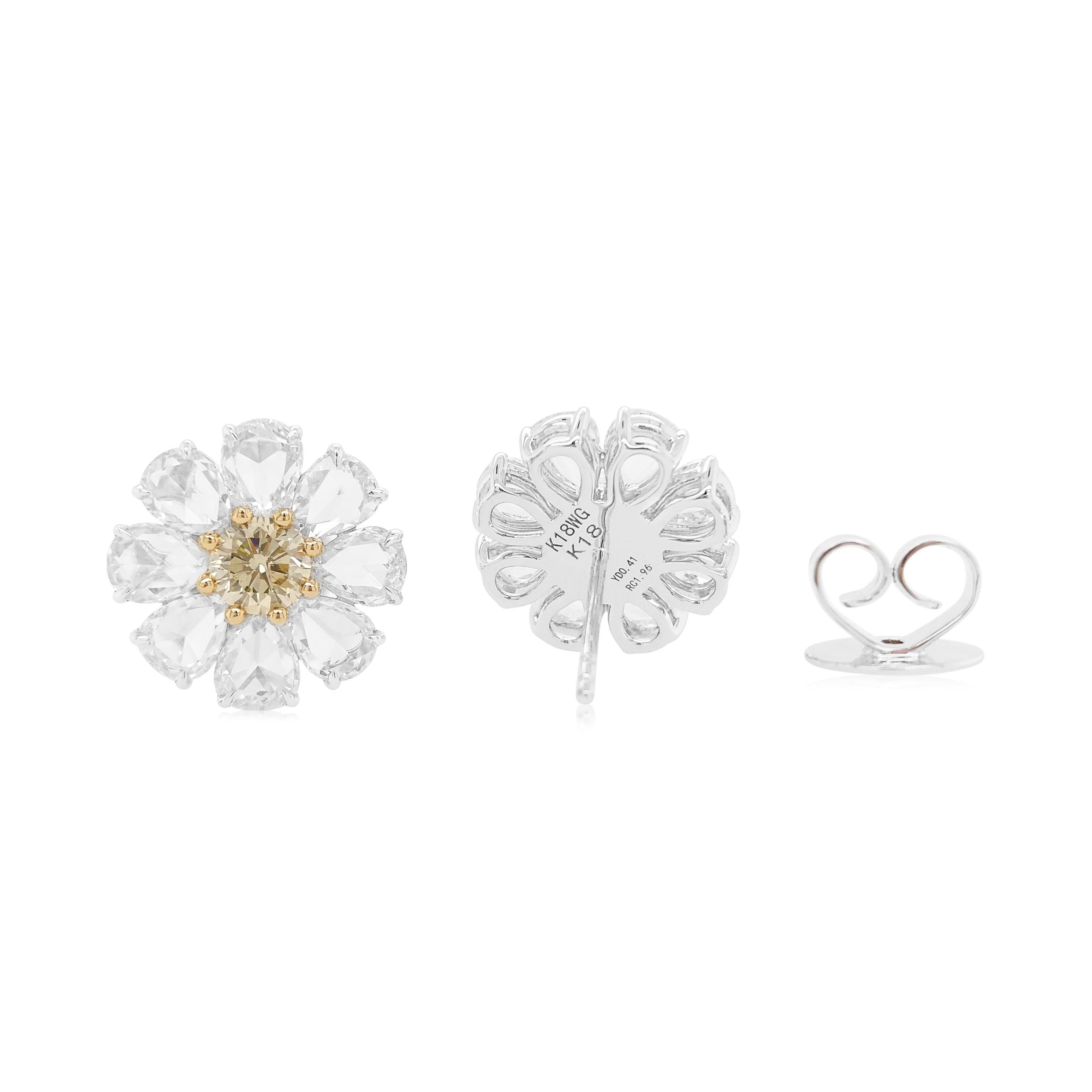 IGI Certified Fancy Yellow Diamond 18K Gold Floral Earrings
Presenting just the right kind of jewelry for this summer season inspired by blooming flowers. Each earring features a central Yellow diamond surrounded by White diamonds to create a