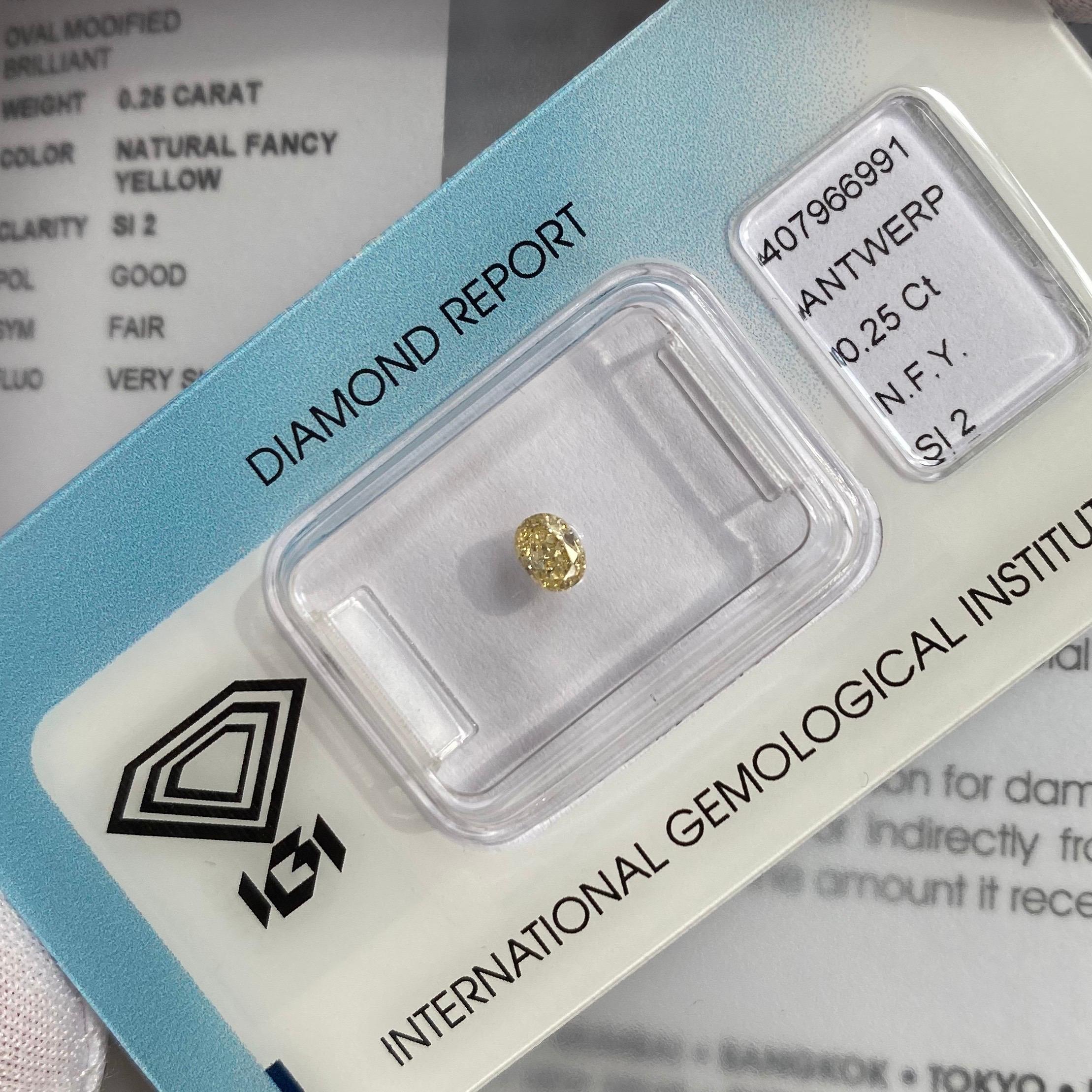 IGI Certified Fancy Yellow Diamond Untreated 0.25 Carat Oval Cut Sealed Blister 2