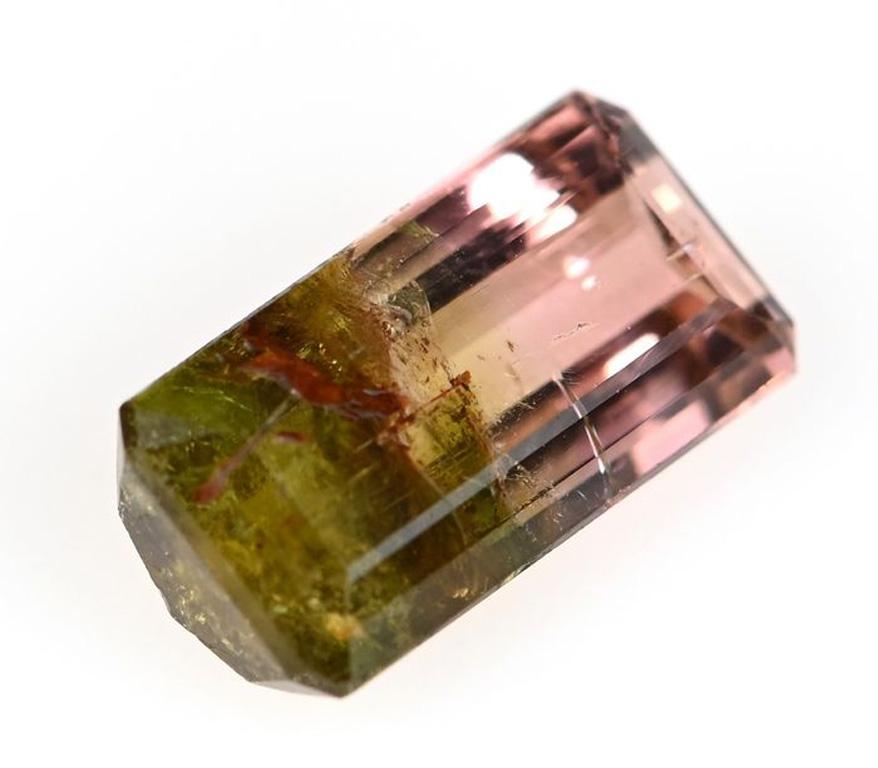 Bi-Color Tourmaline gets its name from its characteristic mix of two colors. Blue and green, pink and yellow, blue and pink, as well as many other combinations. The green and pink watermelon combination is popularly called 