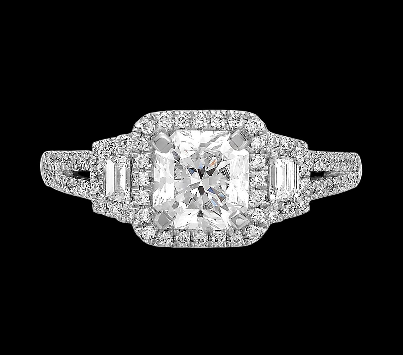 The suggestive romance of glistening diamonds will amaze you with a sparkling new light. Centering special Lucere Cut diamond, two baguette cut diamond on the shoulders and surrounded by round brilliant cut diamonds. 
UK ring size 