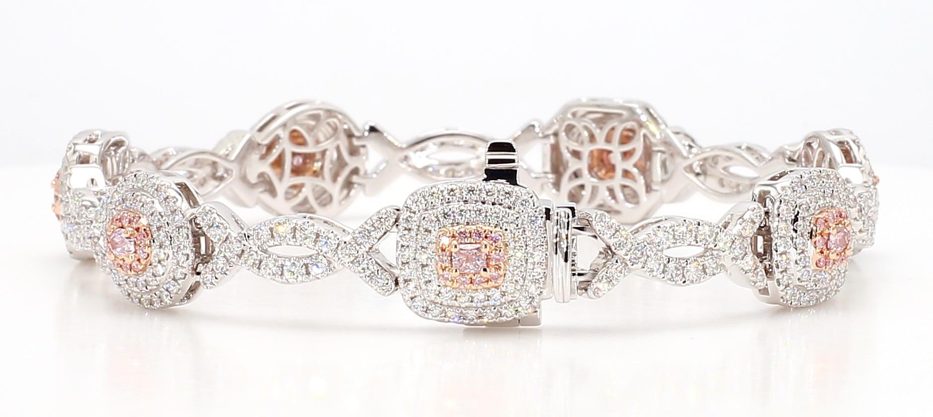 RareGemWorld's intriguing diamond bracelet. Mounted in a beautiful 18K Rose and White Gold setting with 1 natural oval cut pink diamond, 3 natural cushion cut pink diamonds, 1 natural radiant cut pink diamond, and 2 natural pear cut pink diamonds.