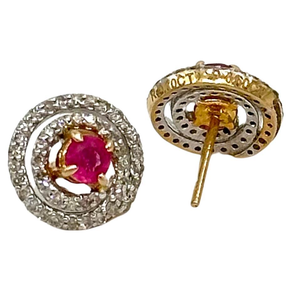 This pair of elegant earring with natural ruby and brilliant cut diamonds in solid 14K gold is a true style statement. These earrings consists of:

Gross weight- 3.18 grams

Diamond type- Brilliant cut diamonds
Diamond origin- Natural real
Diamond