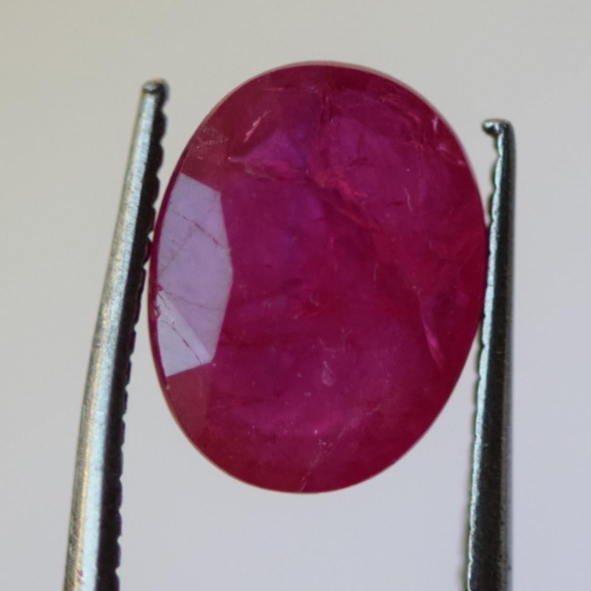 - Species: Natural Corundum
- Variety: Natural Ruby
- Dimensions: 8.98 x 6.94 x 2.92 mm
- Shape / Cut: Oval Mixed Cut
- Weight: 1.89 carat
- Clarity: Translucent
- Color: Pink Red
- Characteristics: Enhanced. Natural rubies are commonly enhanced