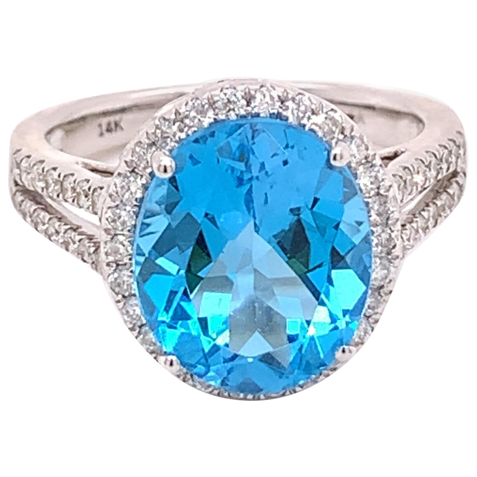 IGI Certified Oval Blue Topaz and Diamond 14k White Gold Halo Ring