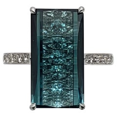 Anello Paolo Costagli certificato IGI con 7,63 CT di tormalina blu e diamanti in oro bianco 18 carati