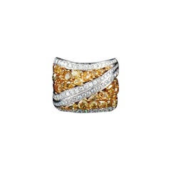 Anillo certificado por IGI con diamantes naturales de colores especiales en oro de 18 quilates